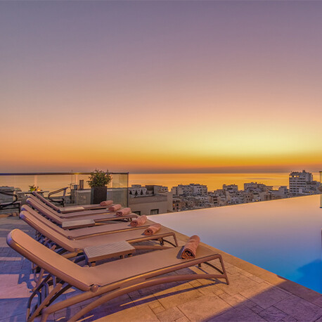 Rooftop outdoor pool at 5-star AX The Palace in Sliema Malta