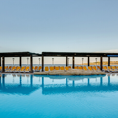 4-star AX Sunny Coast Resort & Spa in Qawra Malta; Outdoor pool