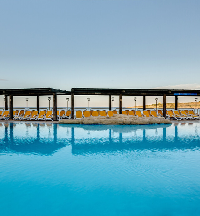 Outdoor pool at AX Sunny Coast Resort & Spa in Qawra