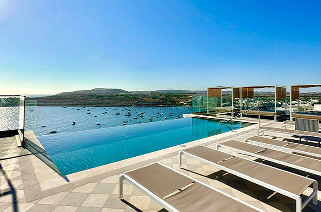 4-star AX Odycy Resort Qawra - Adults only rooftop outdoor pool in Malta